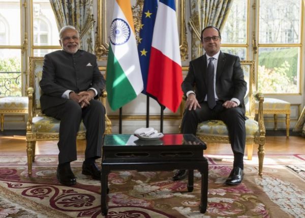 French President Francois Hollande attends a meeting with Indian Prime Minister Narendra Modi at the Elysee Palace in Paris