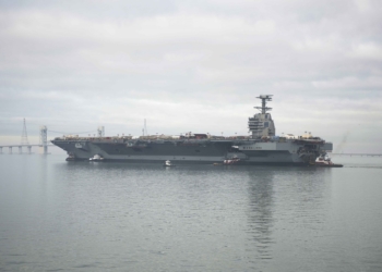 NEWPORT NEWS, Va. (Nov. 17, 2013) – Pre-Commissioning Unit Gerald R. Ford (CVN 78) transits the James River during the ship’s launch and transit to Newport News Shipyard pier three for the final stages of construction and testing.  The Ford was christened Nov. 9, 2013, and is currently under construction at Huntington Ingalls Industries Newport News Shipyard (U.S. Navy photo by Mass Communication Specialist Second Class Aidan P. Campbell/Released)