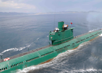 This undated picture released from North Korea's official Korean Central News Agency (KCNA) on June 16, 2014 shows North Korean leader Kim Jong-Un (L in black) inspecting the submarine No. 748 of Korean People's Army (KPA) naval unit 167 led 7th regiment at an undisclosed location in North Korea. AFP PHOTO / KCNA via KNS    REPUBLIC OF KOREA OUT --- THIS PICTURE WAS MADE AVAILABLE BY A THIRD PARTY. AFP CAN NOT INDEPENDENTLY VERIFY THE AUTHENTICITY, LOCATION, DATE AND CONTENT OF THIS IMAGE. THIS PHOTO IS DISTRIBUTED EXACTLY AS RECEIVED BY AFP. ---EDITORS NOTE--- RESTRICTED TO EDITORIAL USE - MANDATORY CREDIT "AFP PHOTO / KCNA VIA KNS" - NO MARKETING NO ADVERTISING CAMPAIGNS - DISTRIBUTED AS A SERVICE TO CLIENTSKNS/AFP/Getty Images