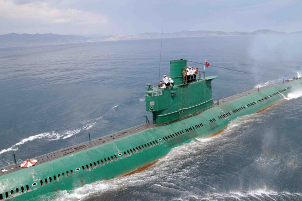 This undated picture released from North Korea's official Korean Central News Agency (KCNA) on June 16, 2014 shows North Korean leader Kim Jong-Un (L in black) inspecting the submarine No. 748 of Korean People's Army (KPA) naval unit 167 led 7th regiment at an undisclosed location in North Korea. AFP PHOTO / KCNA via KNS REPUBLIC OF KOREA OUT --- THIS PICTURE WAS MADE AVAILABLE BY A THIRD PARTY. AFP CAN NOT INDEPENDENTLY VERIFY THE AUTHENTICITY, LOCATION, DATE AND CONTENT OF THIS IMAGE. THIS PHOTO IS DISTRIBUTED EXACTLY AS RECEIVED BY AFP. ---EDITORS NOTE--- RESTRICTED TO EDITORIAL USE - MANDATORY CREDIT "AFP PHOTO / KCNA VIA KNS" - NO MARKETING NO ADVERTISING CAMPAIGNS - DISTRIBUTED AS A SERVICE TO CLIENTSKNS/AFP/Getty Images
