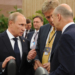 epa04317363 Russian President Vladimir Putin (C) speaks with Russian Finance Minister Anton Siluanov (R) and and the President's Press Secretary Dmitry Peskov (2-R) during the 6th BRICS summit in the city of Fortaleza, Brazil, 15 July 2014. The heads of the BRICS (Brazil, Russia, India, China and South Africa) member states discuss political coordination issues and global governance problems.  EPA/MIKHAIL KLIMENTYEV / RIA NOVOSTI / KREMLIN POOL MANDATORY CREDIT
