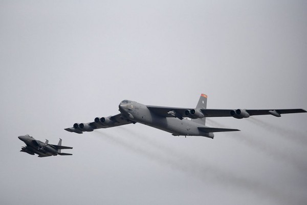 A U.S. Air Force B-52 (R) flies over Osan Air Base in Pyeongtaek, South Korea, January 10, 2016. REUTERS/Kim Hong-Ji TPX IMAGES OF THE DAY