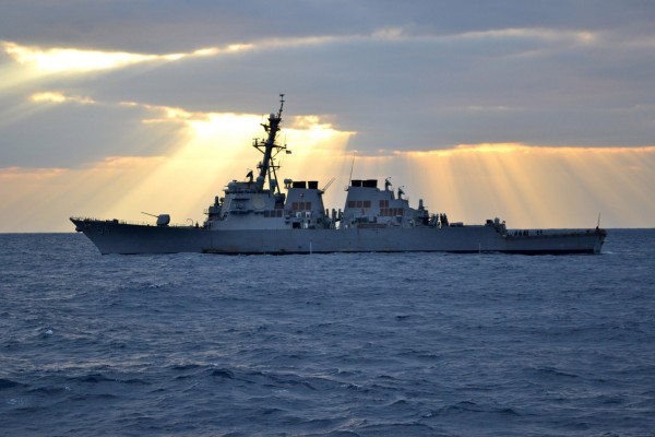 PHILIPPINE SEA (Feb. 01, 2012) - Guided-missile destroyer USS Curtis Wilbur (DDG 54) waits for a passenger transfer amidst the sunrise in the Philippine Sea. Curtis Wilbur is forward-deployed to Yokosuka, Japan. (U.S. Navy Photo by Ensign Jimmy Stokes)