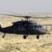A US Army (USA) UH-60L Black hawk Helicopter flies a low-level mission over Iraq during Operation IRAQI FREEDOM.