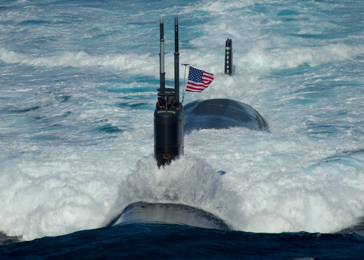 100726-6720T-N-246
EAST SEA (July 26, 2010) The Los Angeles-class attack submarine USS Tuscon (SSN 770) transits the East Sea while leading a 13-ship formation. The Republic of Korea and the United States are conducting the combined alliance maritime and air readiness exercise "Invincible Spirit" in the seas east of the Korean peninsula from July 25-28, 2010. This is the first in a series of joint military exercises that will occur over the coming months in the East and West Seas. (U.S. Navy photo by Mass Communication Specialist 3rd Class Adam K. Thomas/Released)