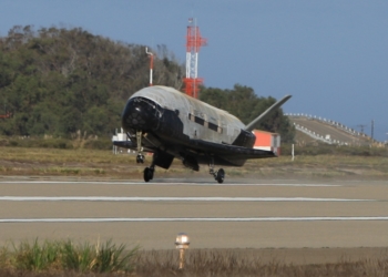 The X-37B Orbital Test Vehicle mission 3 (OTV-3), the Air Force's unmanned, reusable space plane, landed at Vandenberg Air Force Base at 9:24 a.m. Oct. 17, 2014. The OTV-3 conducted on-orbit experiments for 674 days during its mission, extending the total number of days spent on-orbit for the OTV program to 1367 days. The X-37B is the newest and most advanced re-entry spacecraft. Managed by the Air Force Rapid Capabilities Office, the X-37B program performs risk reduction, experimentation and concept of operations development for reusable space vehicle technologies. (Photo credit: Boeing)